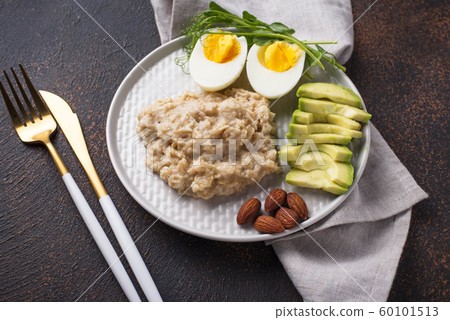 Healthy balanced breakfast in plate 60101513