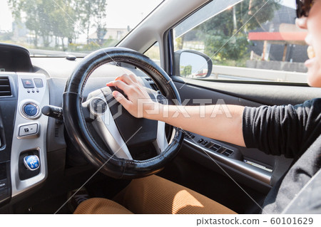 Young woman driving (get angry) Young woman driving (get angry) 60101629