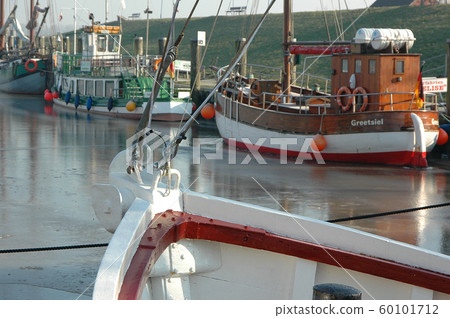 winter time in the harbor of greetisel 60101712