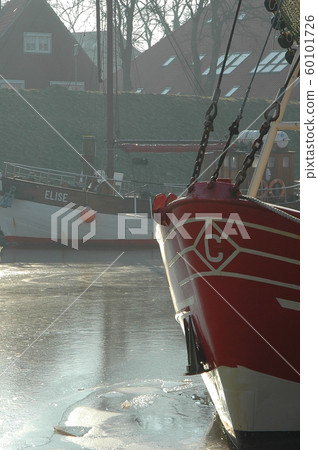 winter time in the harbor of greetisel 60101726