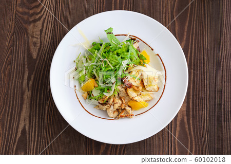 Top view of salad with fried chicken meat, dried 60102018