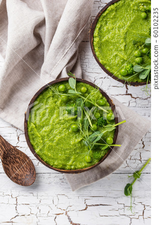 Vegan green broccoli soup or smoothie Vegan green broccoli soup or smoothie 60102235