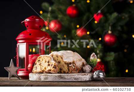 Christmas cake stollen with dried fruits Christmas cake stollen with dried fruits 60102738