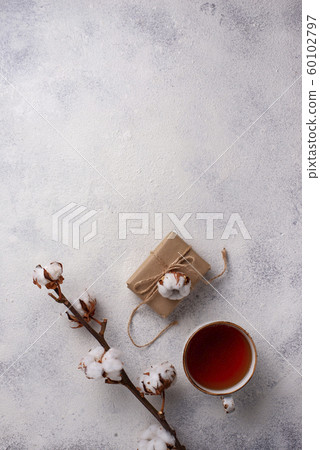 Composition with cotton branch and tea Composition with cotton branch and tea 60102797
