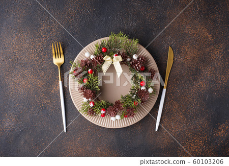 Christmas table setting and golden decor Christmas table setting and golden decor 60103206