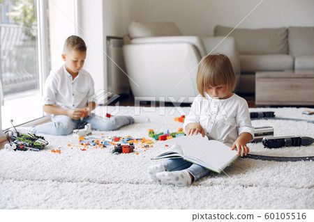 Children playing with lego in a playing room 60105516
