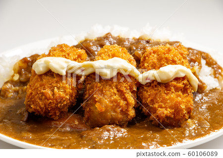 Oyster Fly Curry (Oyster Flight Topping Beef Curry Rice). (White plate / white background) Oyster Fly Curry (Oyster Flight Topping Beef Curry Rice). (White plate / white background) 60106089