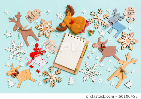 Top view of notebook on blue background made of Top view of notebook on blue background made of 60106453
