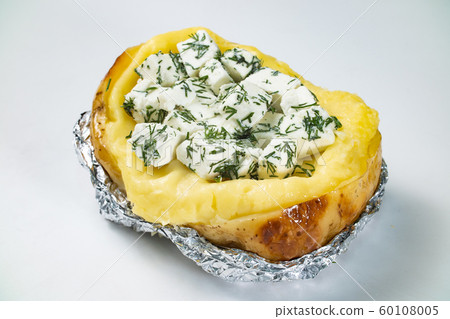 Photo of baked potato with feta cheese filling Photo of baked potato with feta cheese filling 60108005