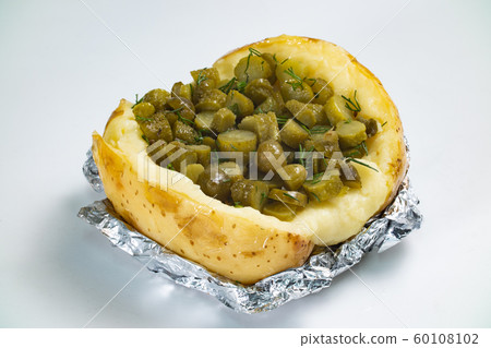 Photo of baked potato with gherkins filling 60108102