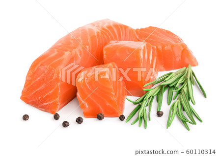 raw salmon piece cube with rosemary and peppercorn isolated on white background close up 60110314