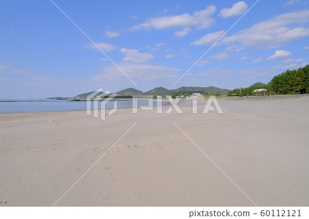 Sandy beach spreading over Eguchihama Seaside Park in the blue sky 60112121