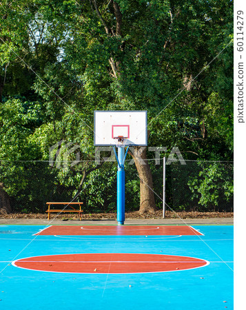 Empty field with basketball stand 60114279