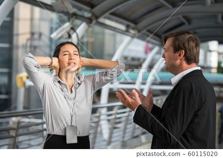 boss yelling female worker in city boss yelling female worker in city 60115020