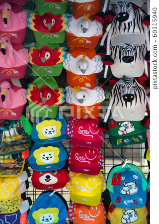 Colorful hat made of fabric Is a souvenir product sold in the shop At Khao Kheow Open Zoo at Chonburi Province in Eastern of Thailand. 60115940