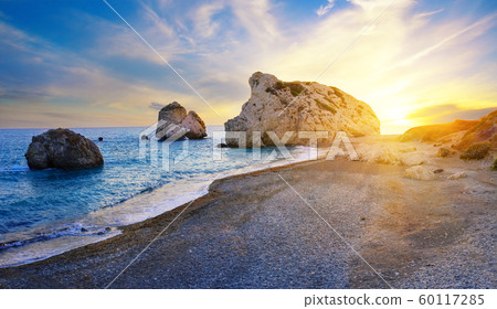 Aphrodite's beach and stone at sunset in bright sunshine Aphrodite's beach and stone at sunset in bright sunshine 60117285