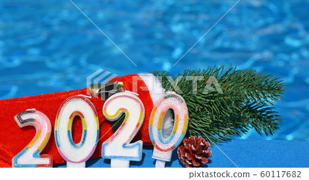 Christmas decorations and pine branch 2020. Christmas decorations and pine branch 2020. 60117682