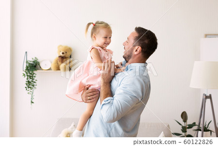 Caucasian daddy playing with cute adopted daughter Caucasian daddy playing with cute adopted daughter 60122826