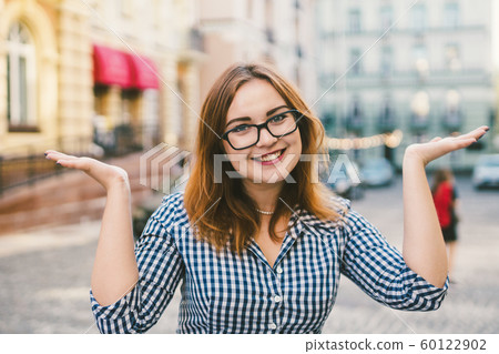 happy stylish woman at old european city street, moment of carefree and true happiness. Young beautiful cheerful woman walking on old street. European trip, old city, summer vacation happy stylish woman at old european city street, moment of carefree and true happiness. Young beautiful cheerful woman walking on old street. European trip, old city, summer vacation 60122902