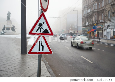 Foggy city street with cars Foggy city street with cars 60122933