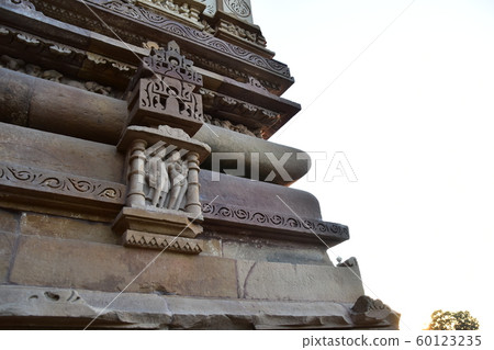 印度卡修拉荷，世界遺產卡修拉荷神廟，美麗的雕塑和黃昏 60123235