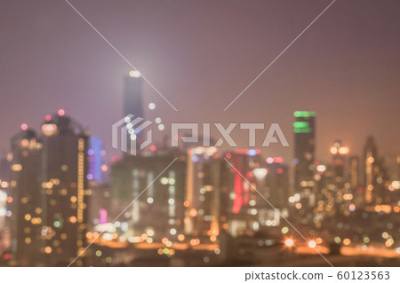 Blur city background rooftop view of Bangkok cityscape business building landscape night lights bokeh Blur city background rooftop view of Bangkok cityscape business building landscape night lights bokeh 60123563