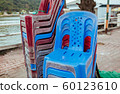 Plastic chairs on the street in summer Asia 60123610