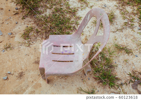 Plastic chairs on the street in summer Asia 60123618