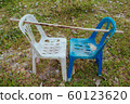 Plastic chairs on the street in summer Asia 60123620