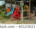 Plastic chairs on the street in summer Asia 60123621