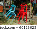 Plastic chairs on the street in summer Asia 60123623