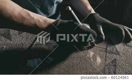 Glass cutting and processing for fireplace doors. Circular glass cutter. Worker cut glass with glass cutting diamond. Glass cutting and processing for fireplace doors. Circular glass cutter. Worker cut glass with glass cutting diamond. 60124861