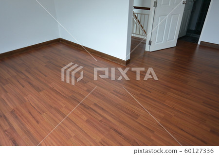brown wood laminate floor in residential house 60127336