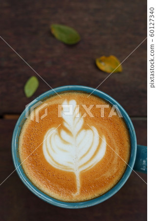 hot latte coffee drink put on wooden table in the morning day hot latte coffee drink put on wooden table in the morning day 60127340
