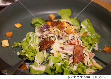 bacon salad on bowl in restaurant bacon salad on bowl in restaurant 60127888