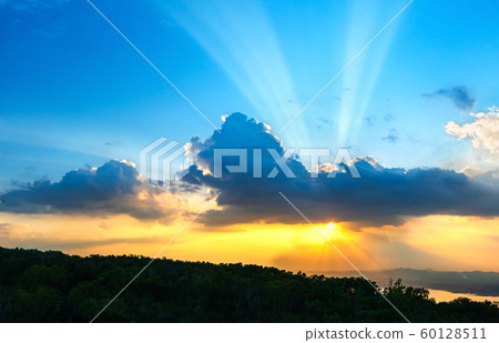 Sunset sky with ray light in twilight time Sunset sky with ray light in twilight time 60128511