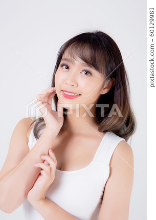 Beautiful woman asian makeup of cosmetic, beauty asia girl hand touch cheek and smile attractive Beautiful woman asian makeup of cosmetic, beauty asia girl hand touch cheek and smile attractive 60129981