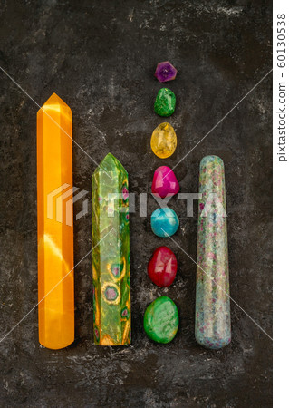 Natural gem geological crystals and stones on a dark texture background 60130538