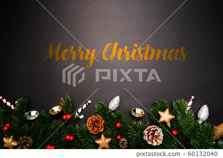 Christmas pine tree with xmas decoration on black background Christmas pine tree with xmas decoration on black background 60132040
