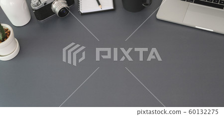 Top view of modern workplace with laptop computer Top view of modern workplace with laptop computer 60132275