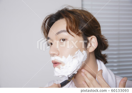 Close-up portrait of attractive young asian man, single man's lifestyle 101 Close-up portrait of attractive young asian man, single man's lifestyle 101 60133093