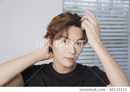 Close-up portrait of attractive young asian man, single man's lifestyle 057 60133123