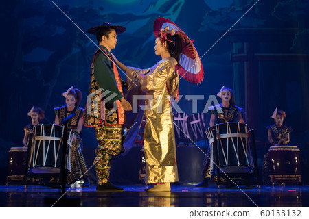 Traditional Japanese performance. Couple in Traditional Japanese performance. Couple in 60133132