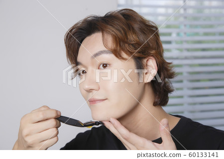 Close-up portrait of attractive young asian man, single man's lifestyle 045 Close-up portrait of attractive young asian man, single man's lifestyle 045 60133141