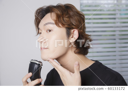Close-up portrait of attractive young asian man, single man's lifestyle 040 Close-up portrait of attractive young asian man, single man's lifestyle 040 60133172