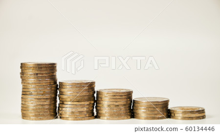 Business concept of saving money on investment on white background, Stack coins. Thai letter meaning is King of Thailand Business concept of saving money on investment on white background, Stack coins. Thai letter meaning is King of Thailand 60134446