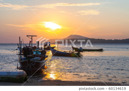 fishing boats in the sea in beautiful sunrise fishing boats in the sea in beautiful sunrise 60134619