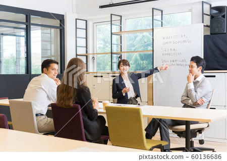 Foreigners studying Japanese 60136686