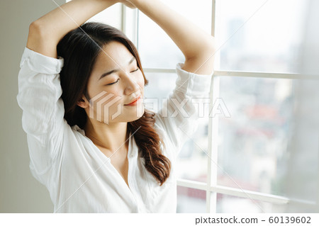 Female lifestyle waking up 60139602
