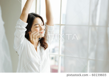Female lifestyle waking up 60139603